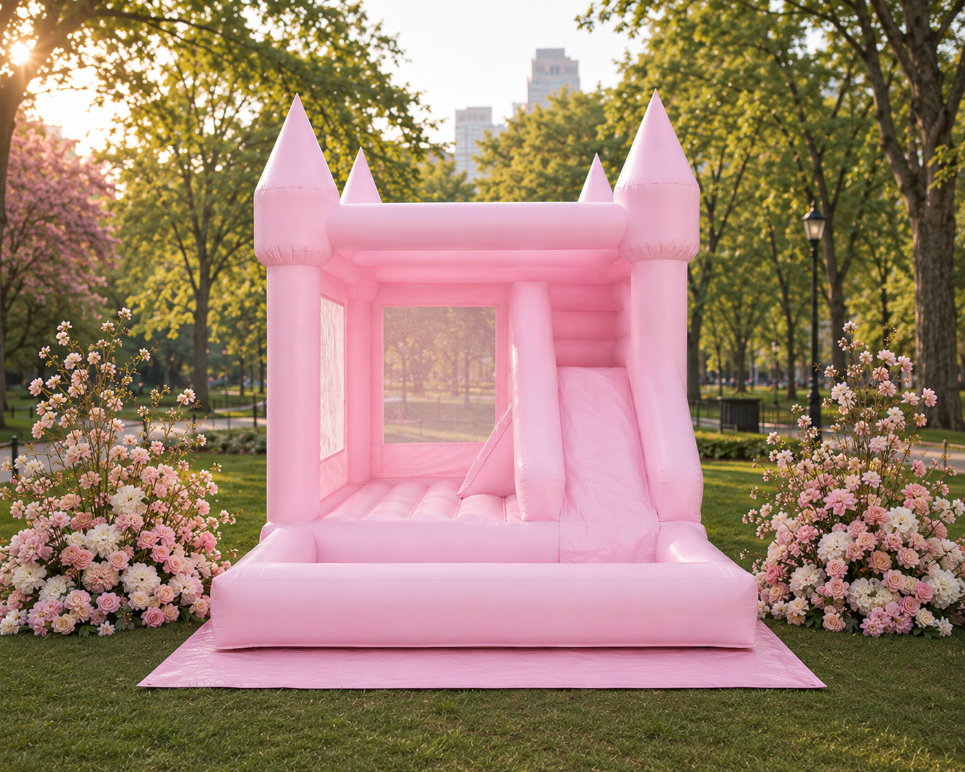 White bounce house in elegant garden setting