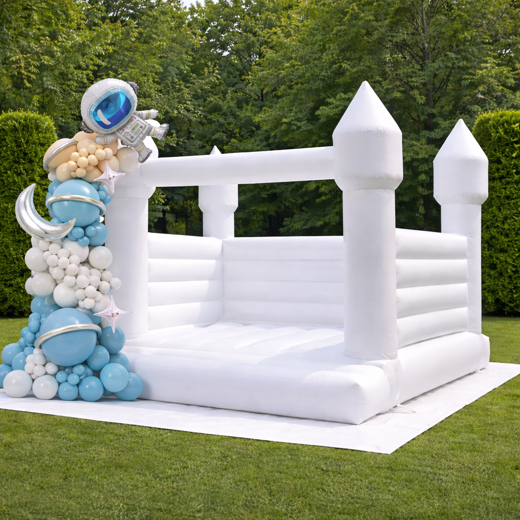 White bounce house in elegant garden setting